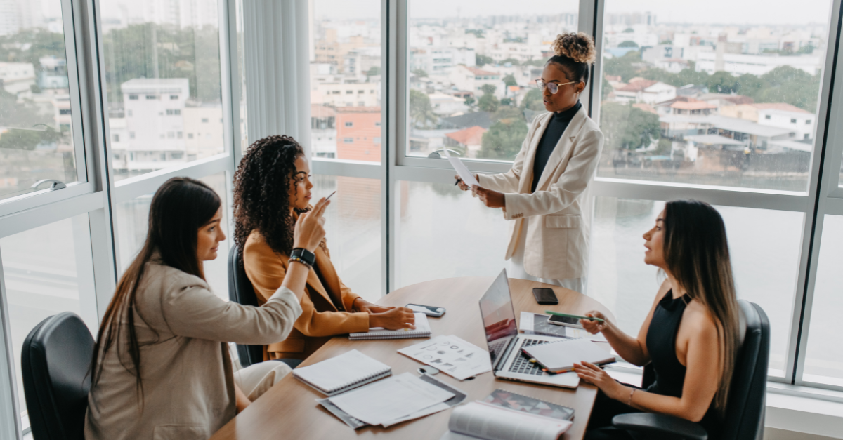Woman sitting thoughtfully while engaging with Change Leadership concepts in a calm workspace.